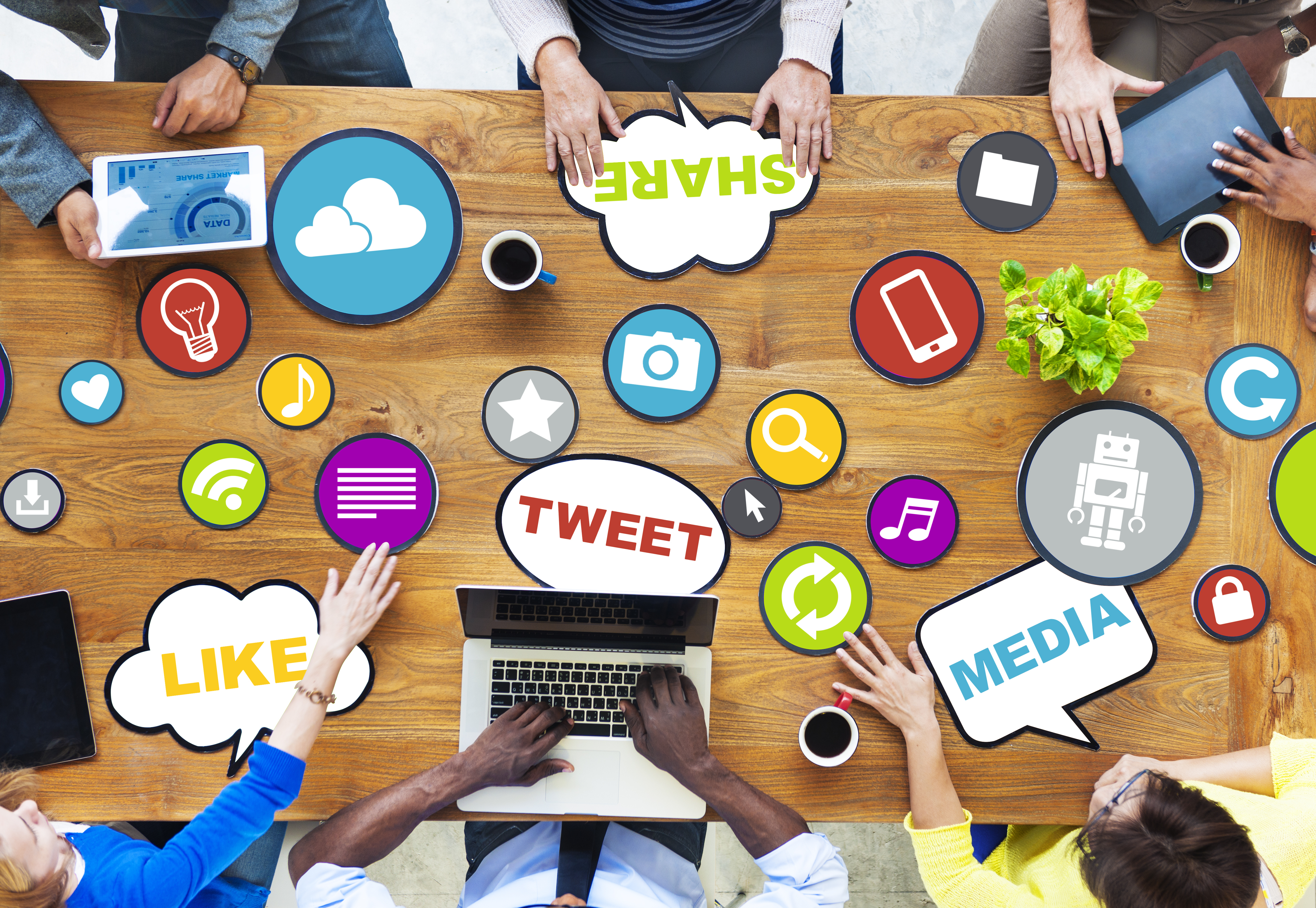 People sharing ideas on a table