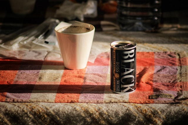 canned coffee stretched horizontally
